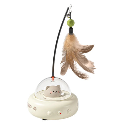 Cat toy with a transparent dome, small cat figure, and feather on a white background